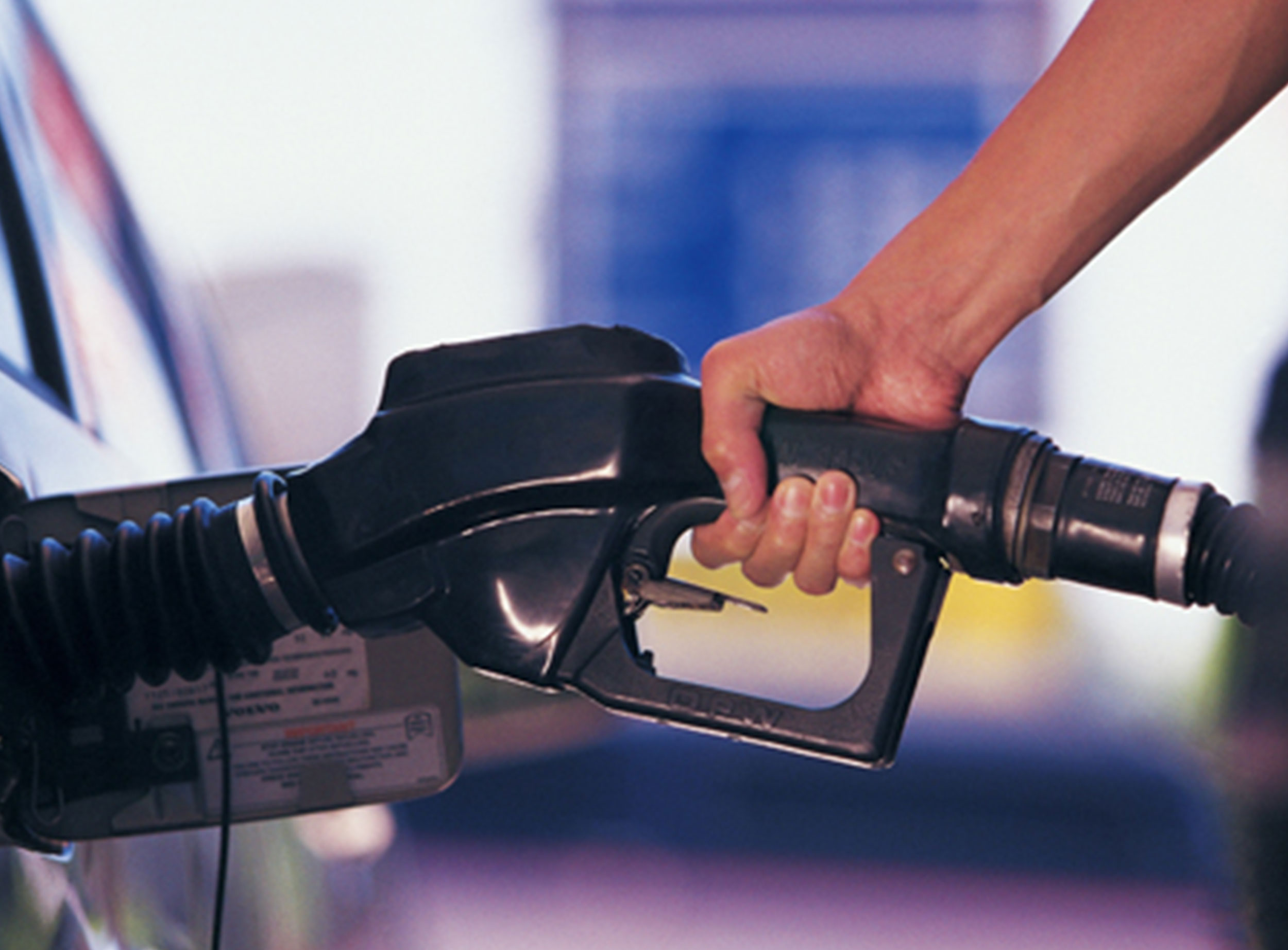 image of person pumping gas