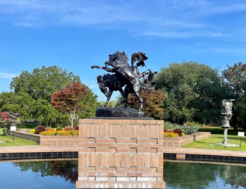 image of statue with water behind in Myrtle Beach