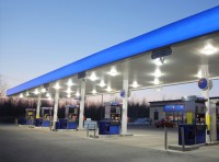 image of gas station at night