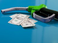 image of gas pump with cash
